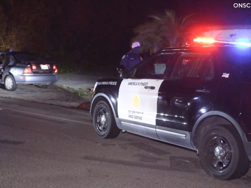 Police approach stolenvehicle